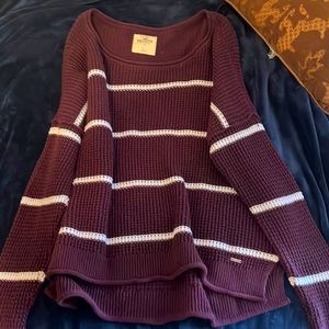 this is a nice dark purple Hollister sweater, it can go off the shoulders